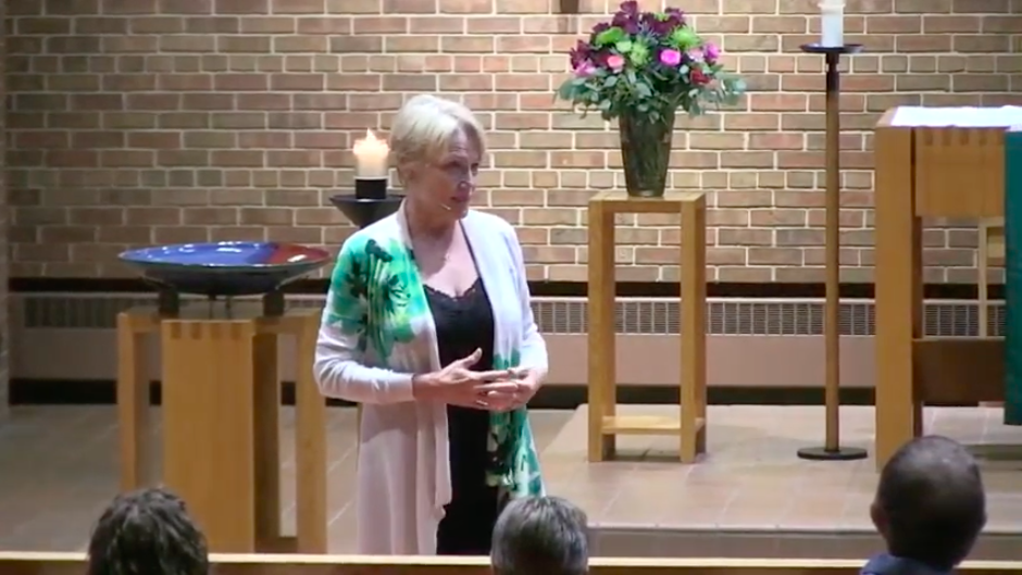 Jeanne Cotter giving sermon at Nativity.