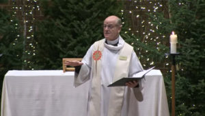 Pastor Glenn Seefeldt preaching in Nativity's sanctuary