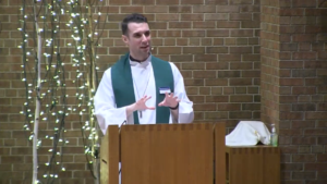 Pastor Ben Shori preaching in the Nativity sanctuary