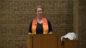 Hannah Campbell Gustafson preaching at Nativity Lutheran Church