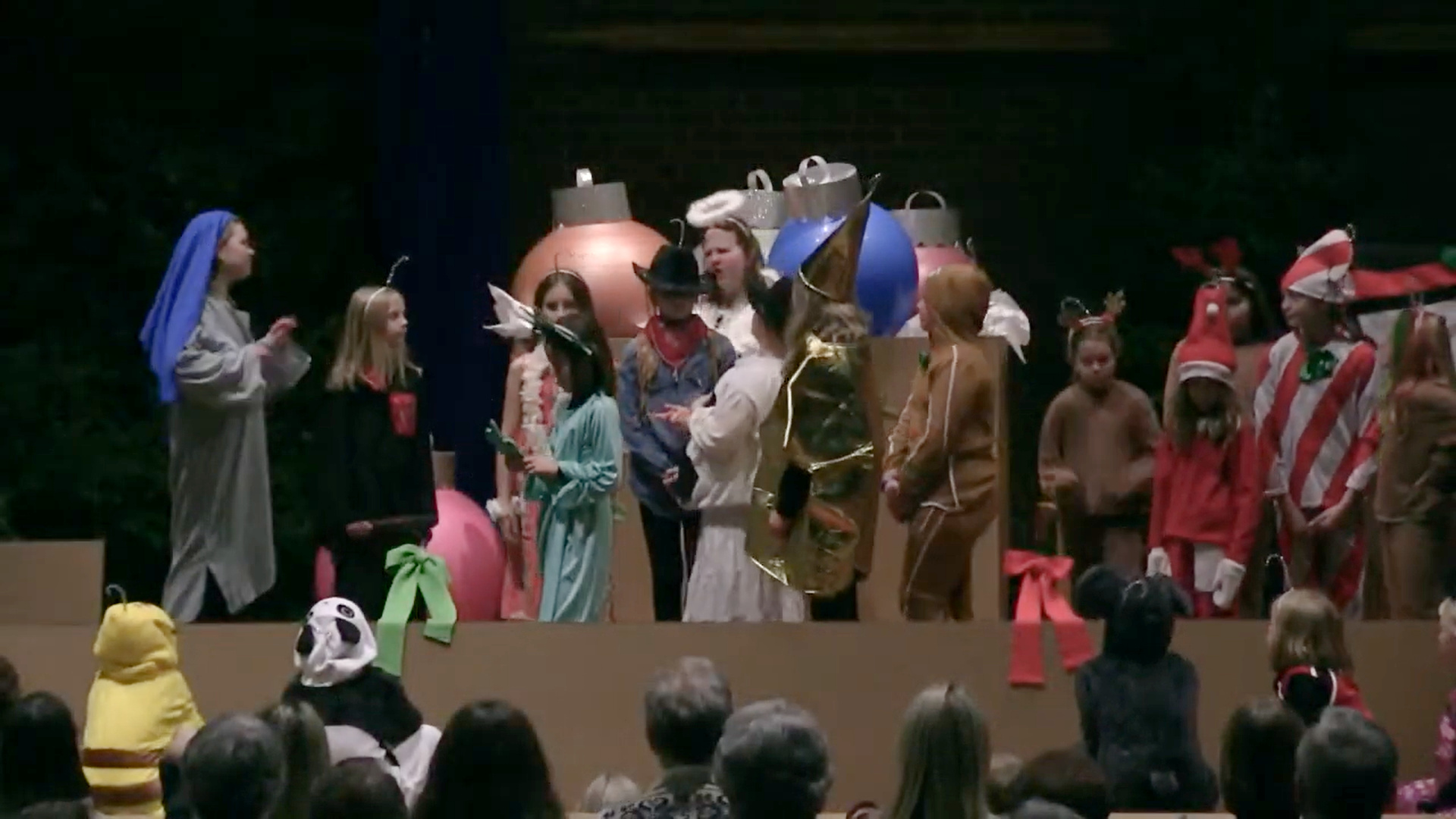 Children performing the musical "Christmas Hang-Ups" in the Nativity Lutheran Church sanctuary