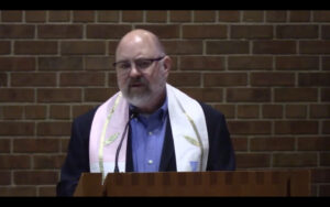 Rev. Dr. Justin Sabia-Tanis preaching at Nativity Lutheran Church