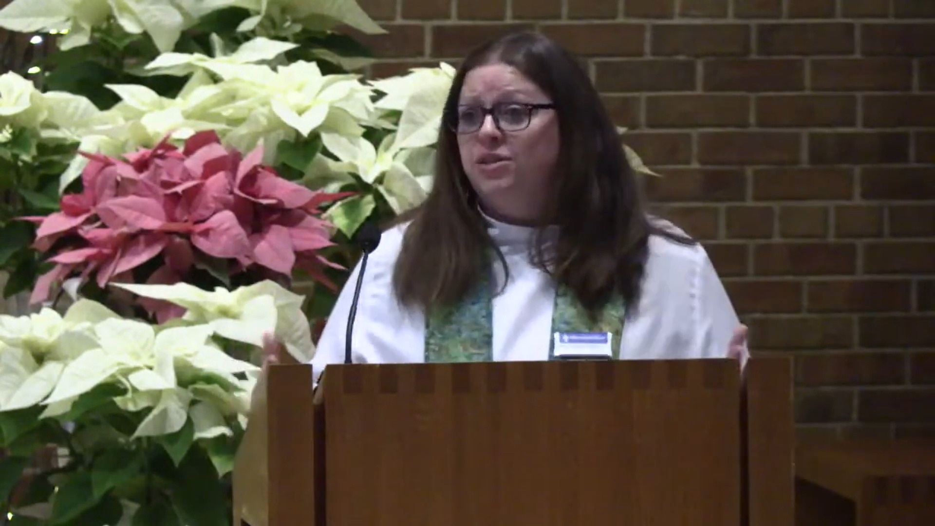 Pastor Angela LaMoore preaching in Nativity Lutheran Church's sanctuary