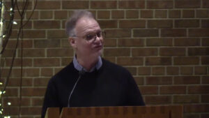 Dan Bielenberg preaching in Nativity sanctuary
